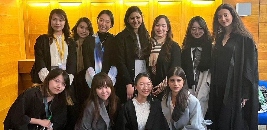 Group of eleven female Cambridge MFin students.